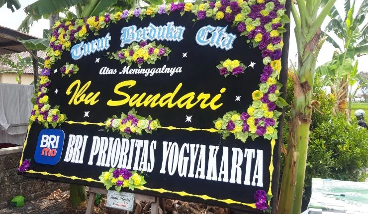 papan bunga duka cita